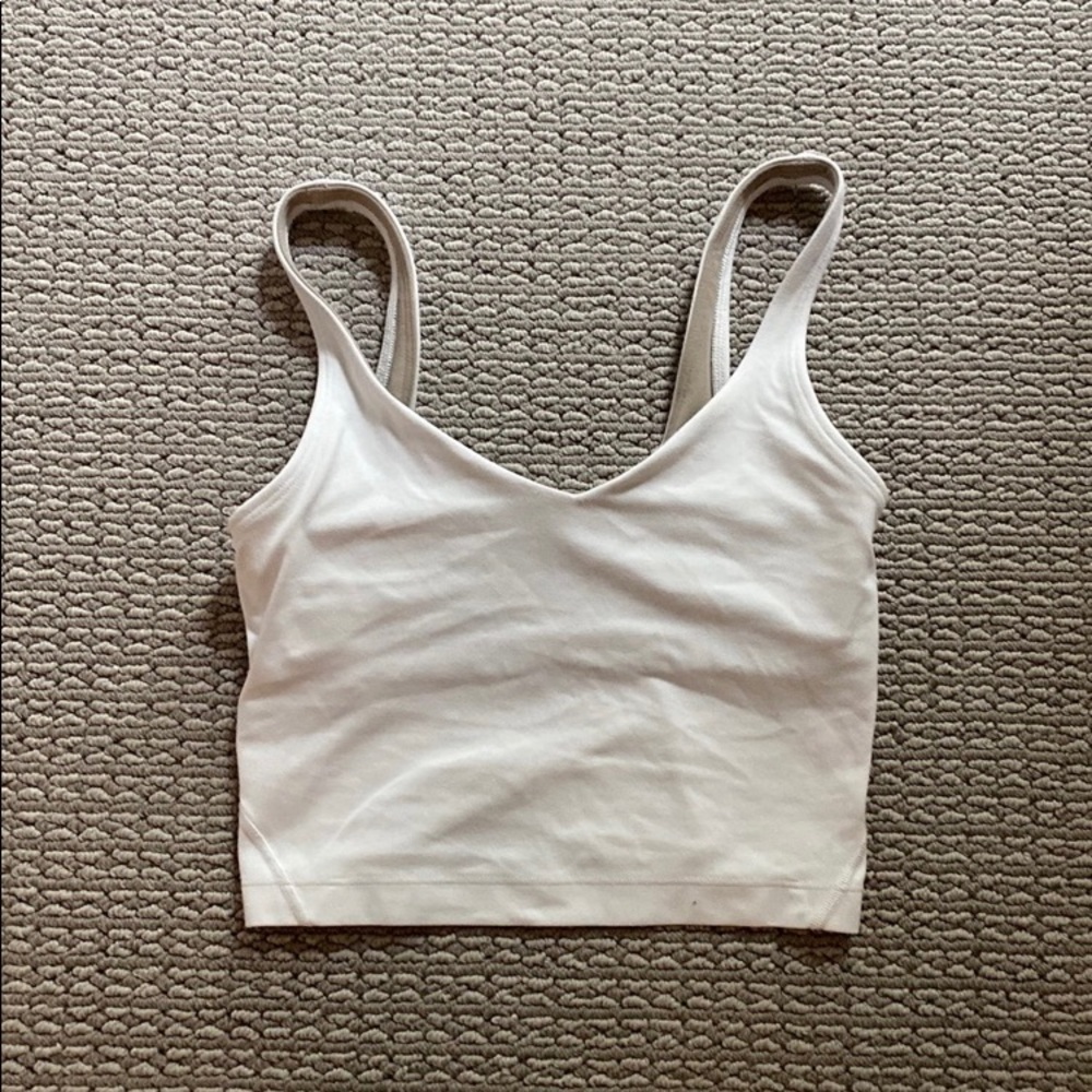 Size 0 Lululemon align white tank. In great condition! Just no padding